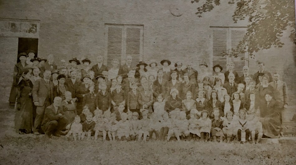 old photograph of quakers in front of building in virginia