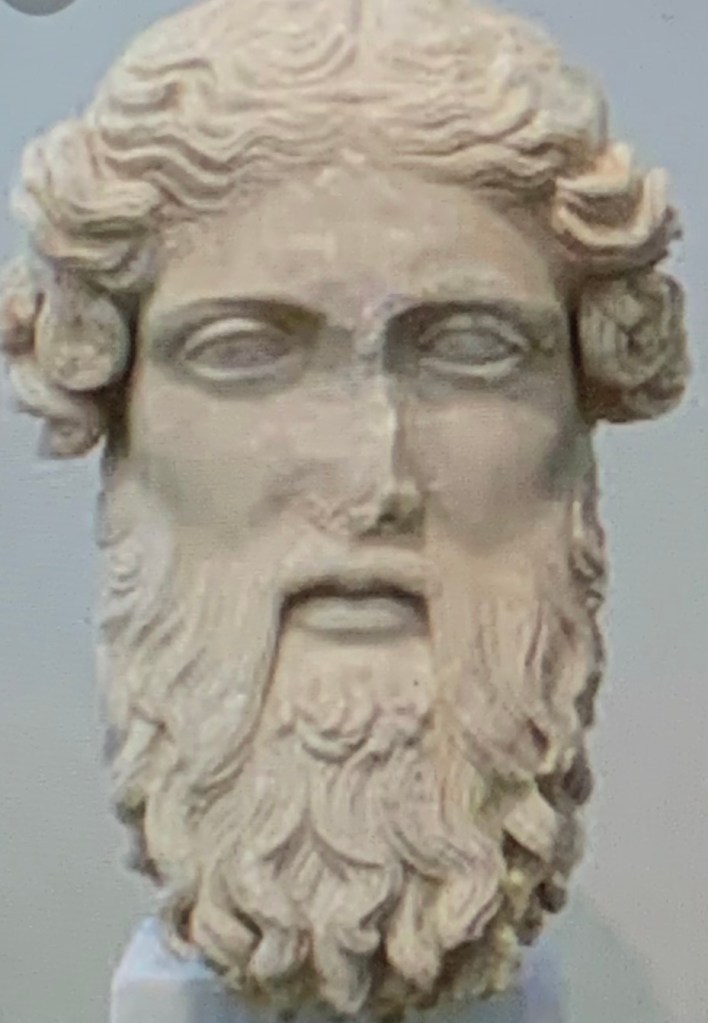 marble carved male head with beard
