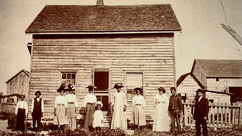 black canadians outside farmhouse