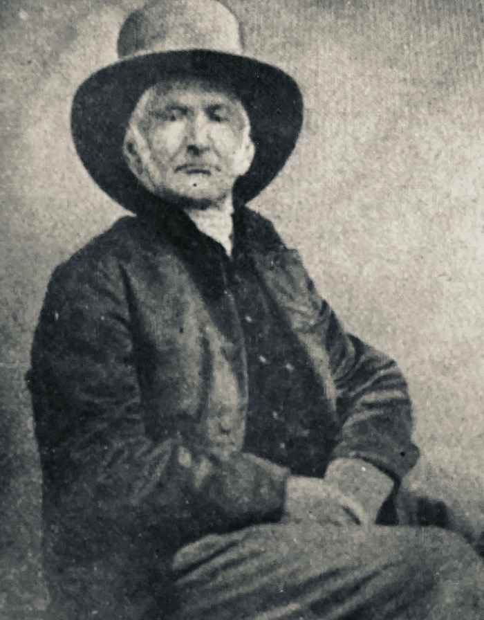 old man in hat and coat